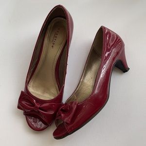 Kenneth Cole Reaction red pumps heels on the Avenue 8.5